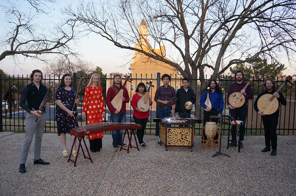 Chinese Ensemble Standing outside on UNT's campus