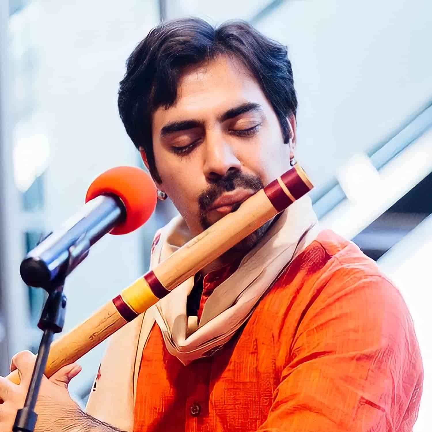vivek v playing an instrument 