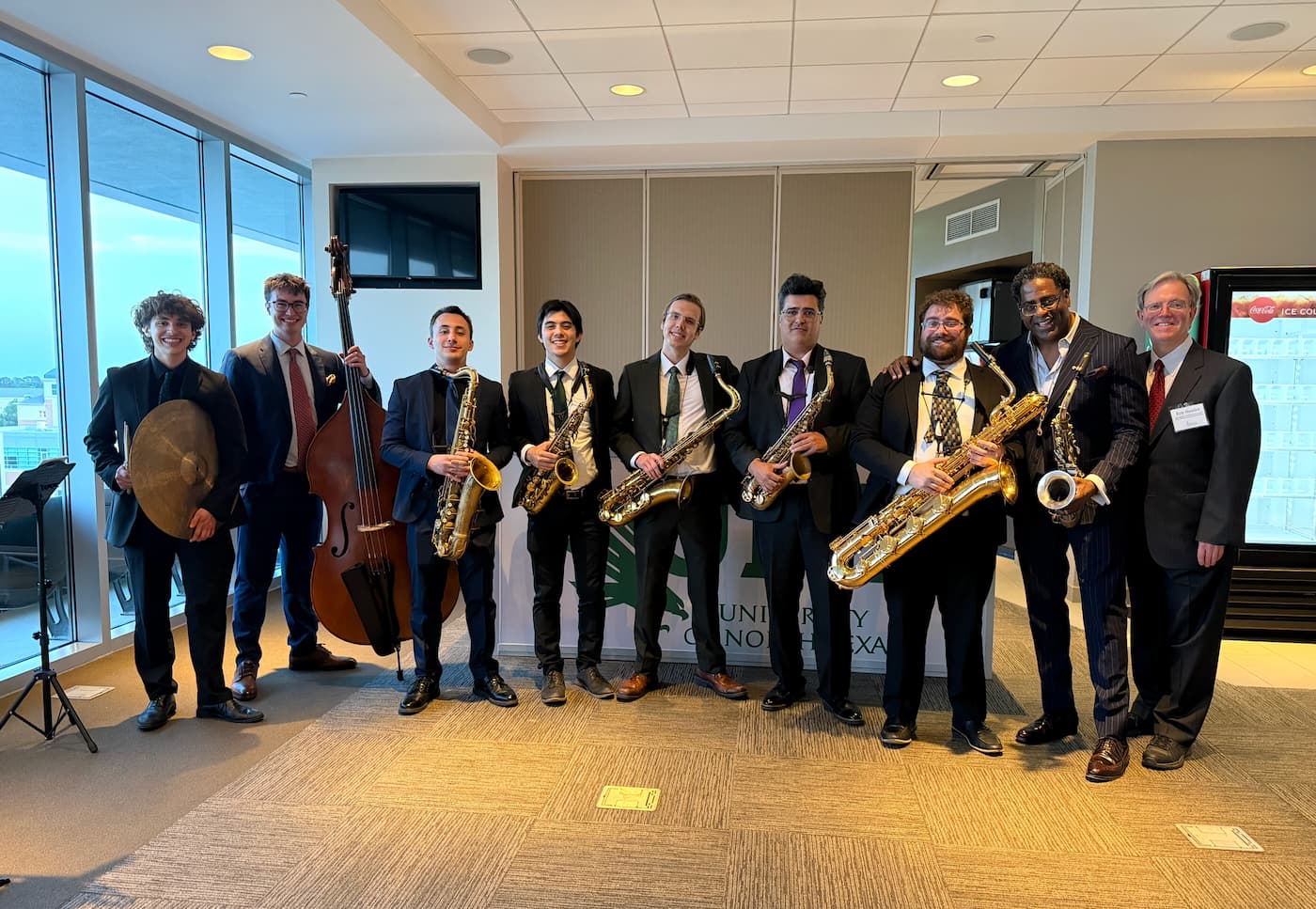 The One O'clock Lab Band poses for a photo with Brad Leali and Eric Nestler