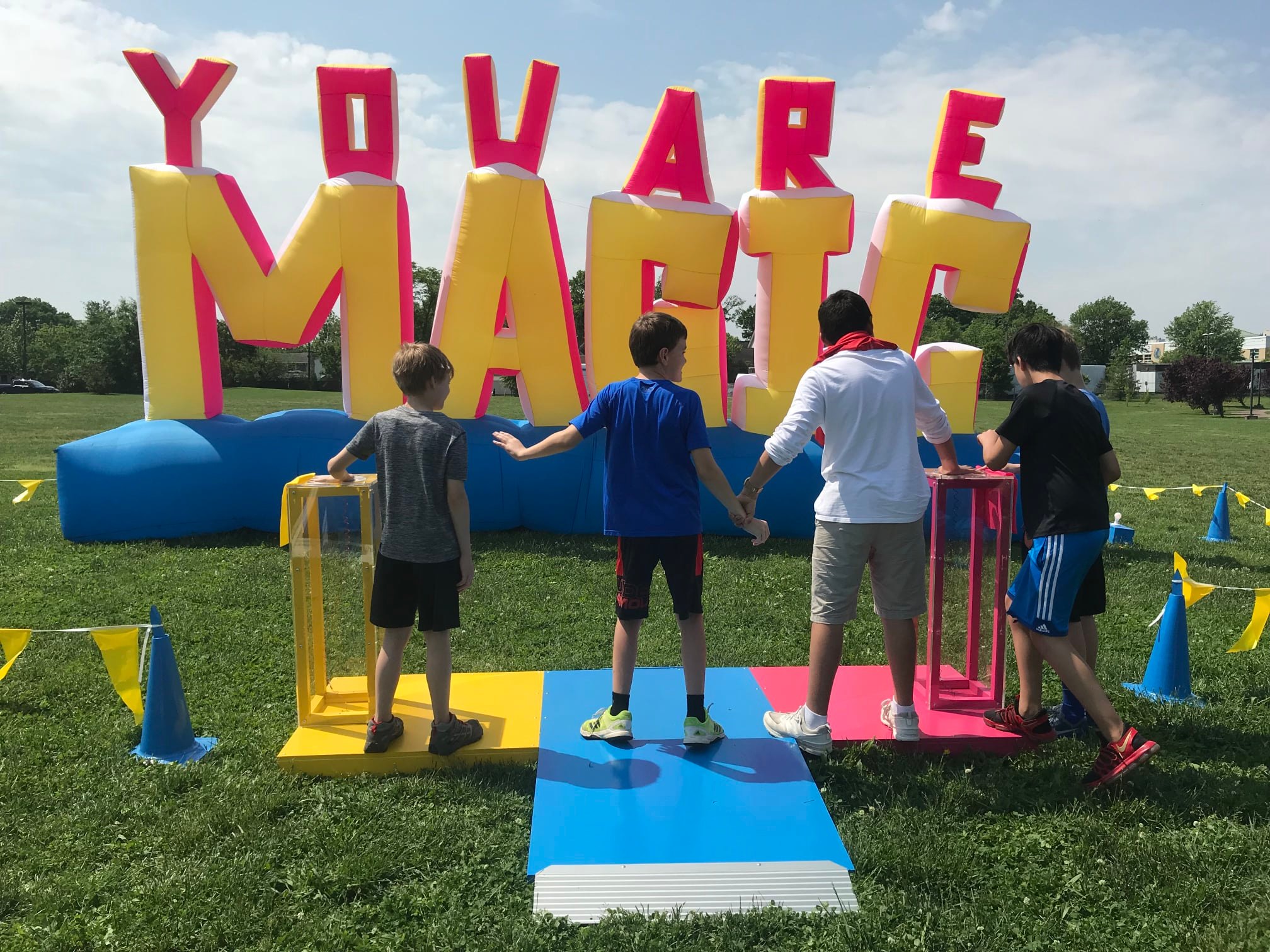 Inflatable sign (like a bouncy house) that says you are magic.