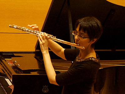 Elizabeth McNutt performing on flute