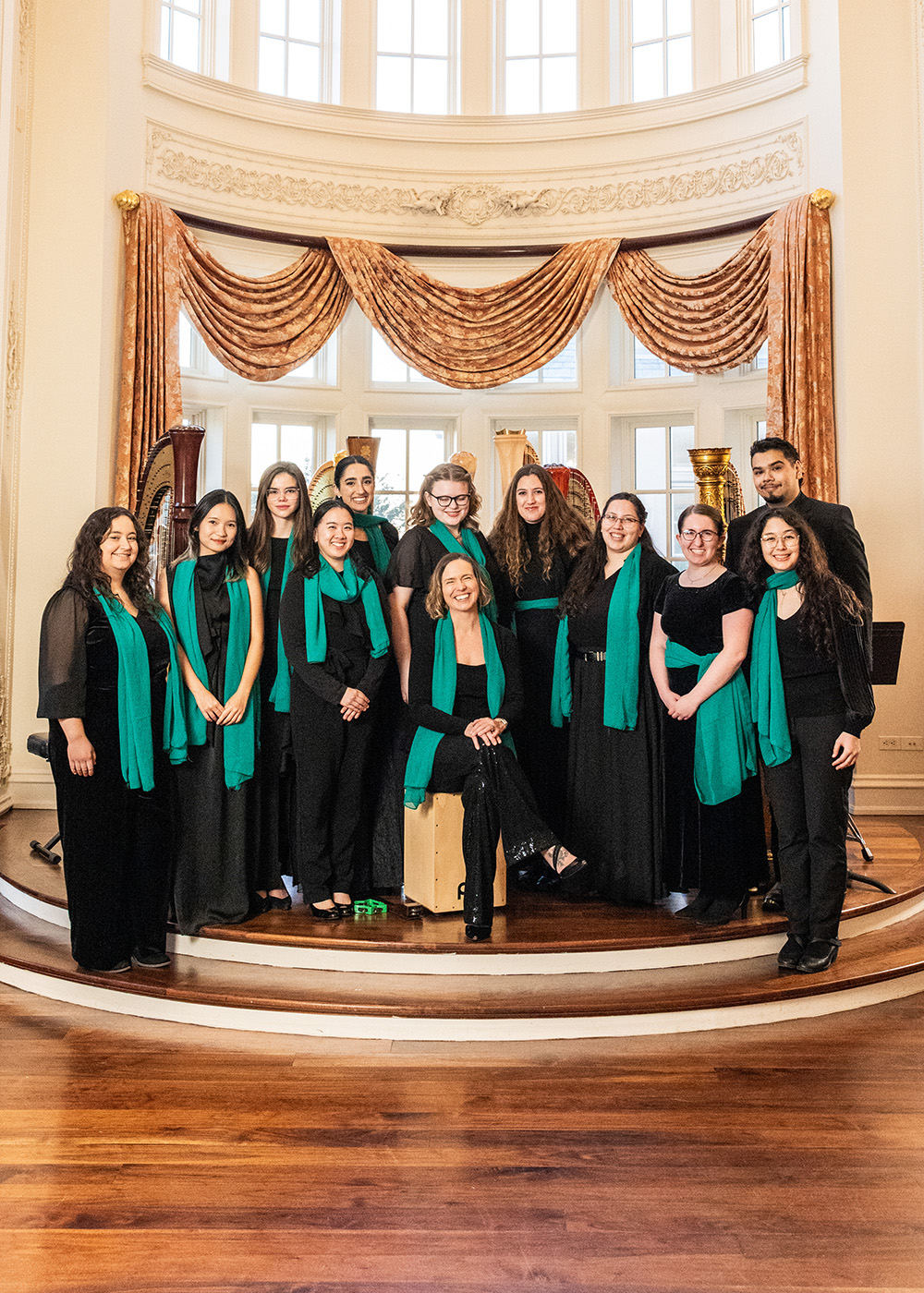 UNT HarpBeats posed standing onstage