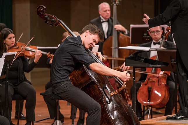 Orchestra playing on stage.